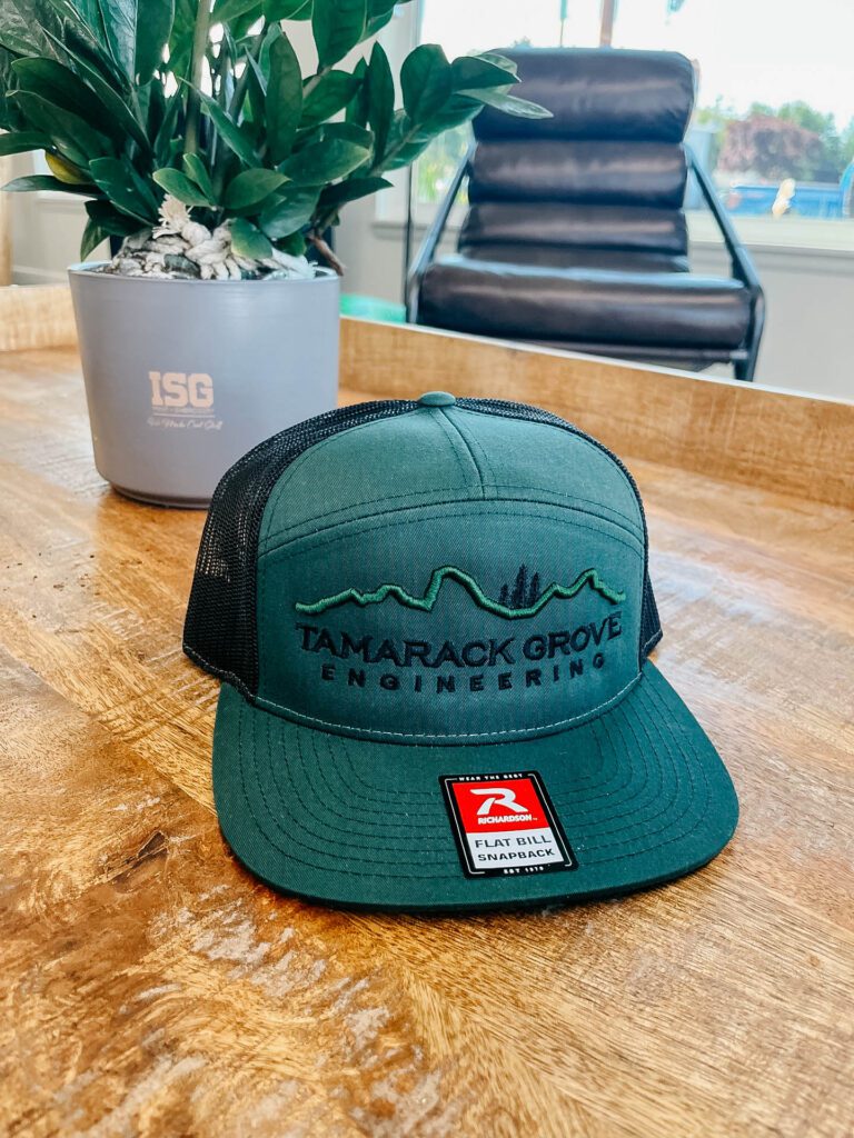 Tamarack Grove Engineering embroidered hat on table